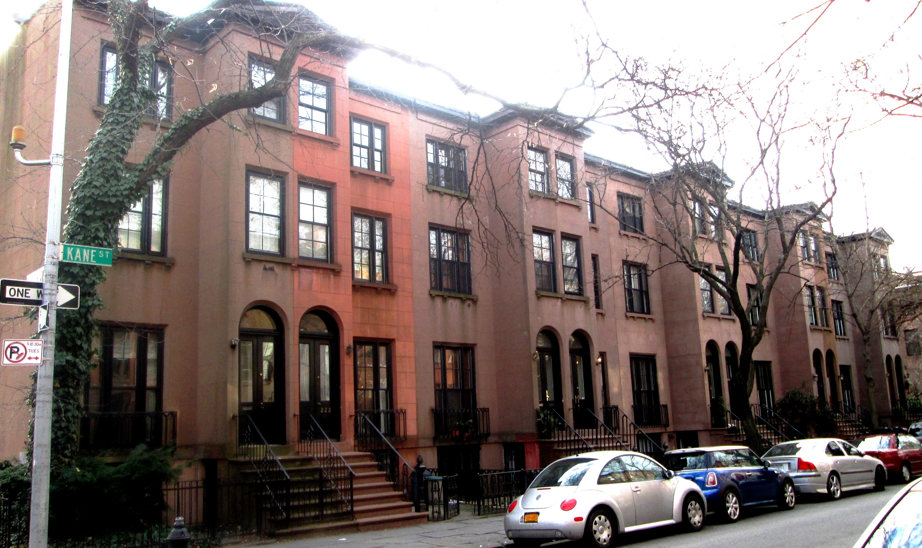Brownstone-lined residential street in New York City